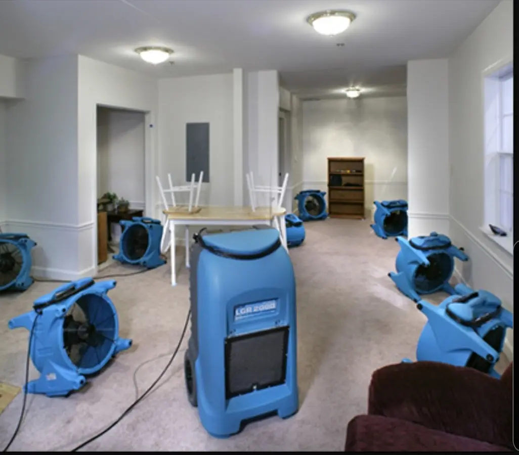 Air movers and dehumidifier setup for Water Damage Restoration in Stoughton